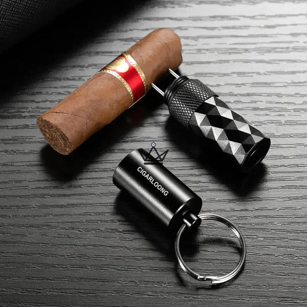 Diamond-faceted cigar punch keychain, 5 colors — FACETTE – 12/21