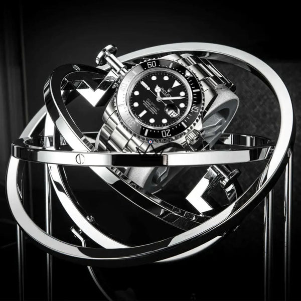 Single watch winder under a glass dome with gyroscopic rings - ASTROLABE