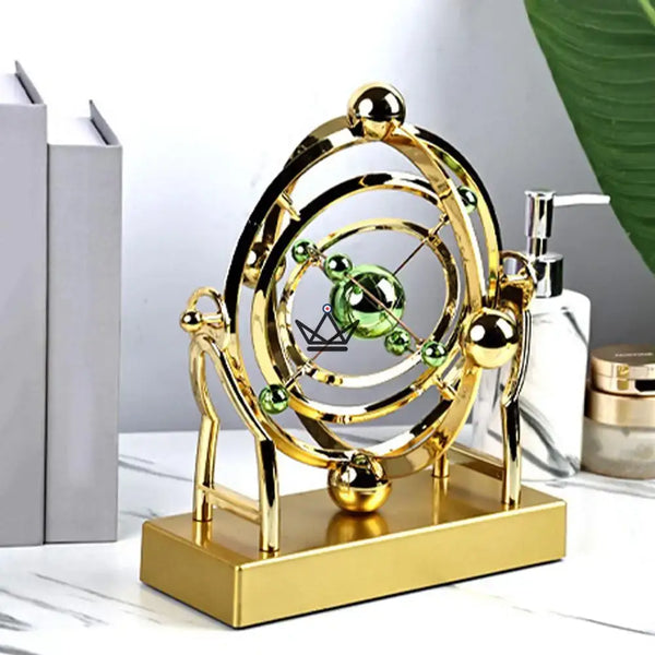 Golden celestial orbit kinetic desk sculpture - ASTRALIS
