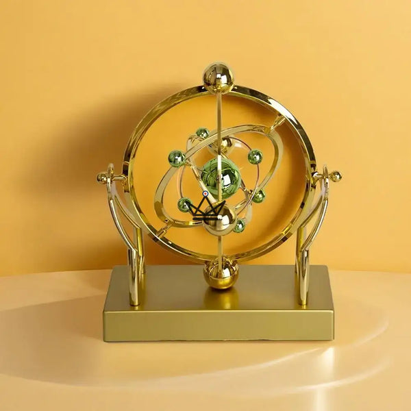 Golden celestial orbit kinetic desk sculpture - ASTRALIS