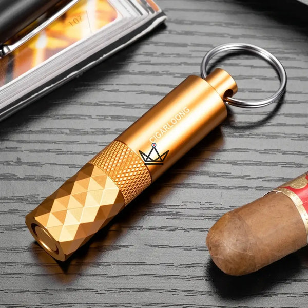 Diamond-faceted cigar punch keychain, 5 colors — FACETTE, Gold